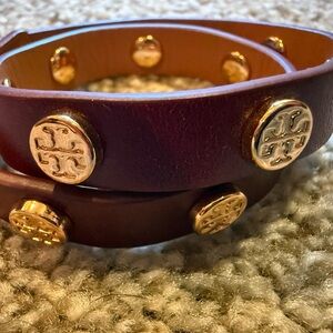 Tory Burch Miller Garnet and Gold Leather Bracelet wrap with carrying pouch.